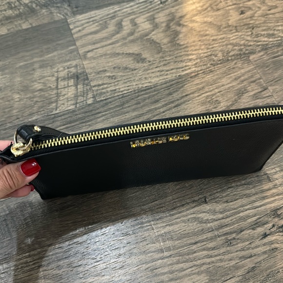 Michael Kors Jet Set Travel Large Perforated Wristlet in Black & Gold - Picture 3 of 6